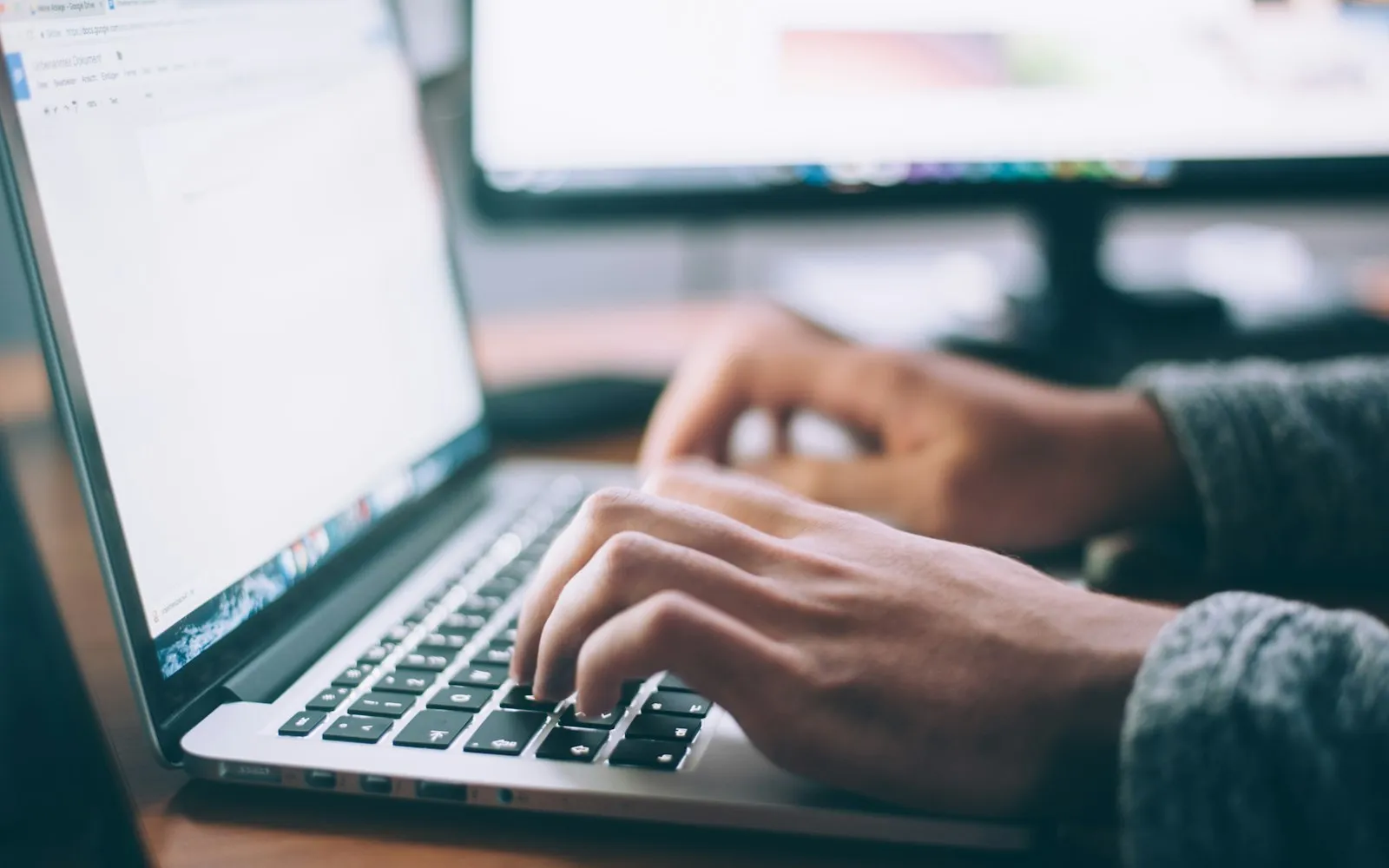Person using MacBook Pro