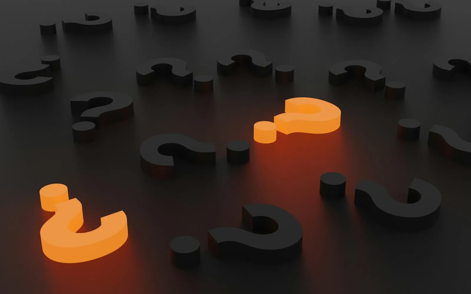 3D rendered question marks in orange and gray